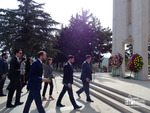 Laying flowers at the War Memorial in Stepanakert